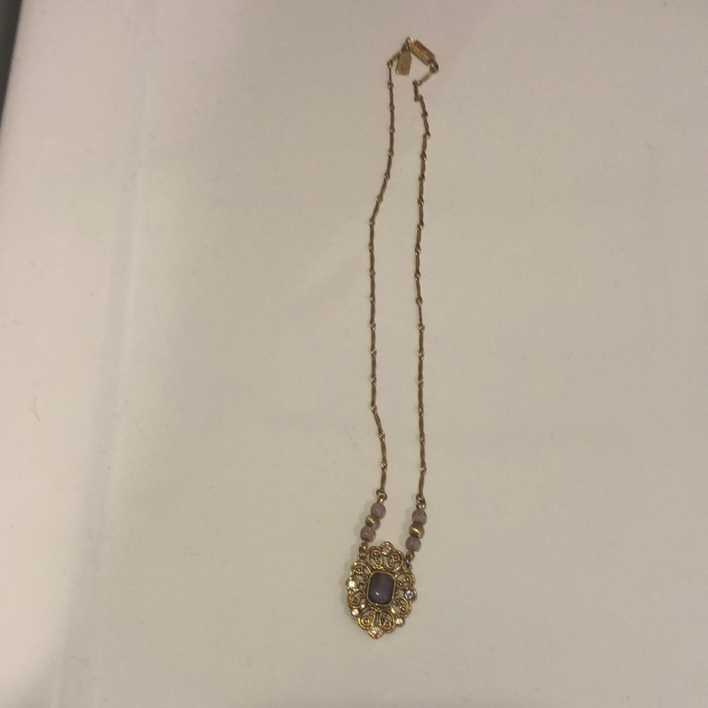 Vintage 1928 gold and purple necklace.